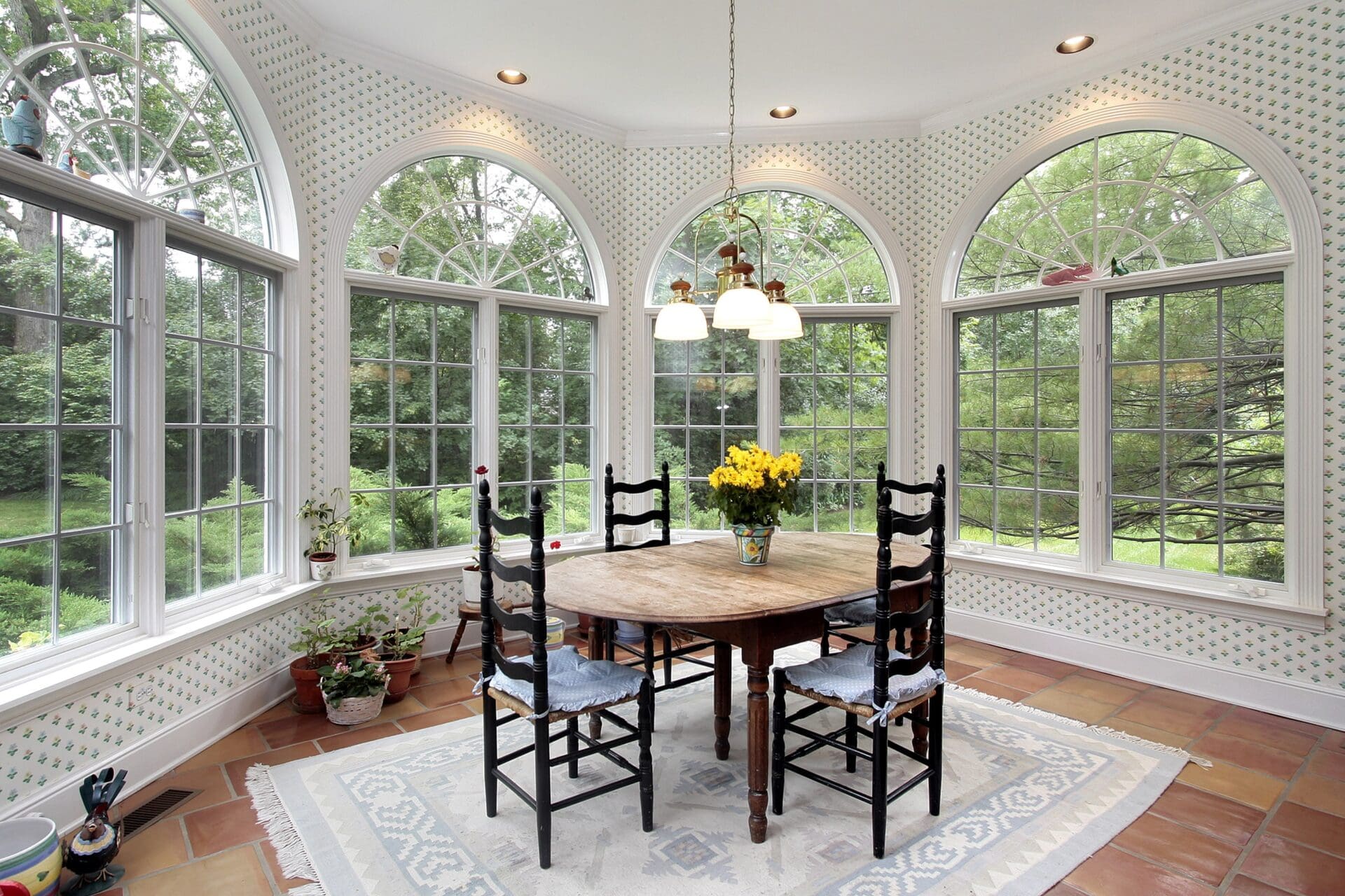 Eating area with large round glass picture windows